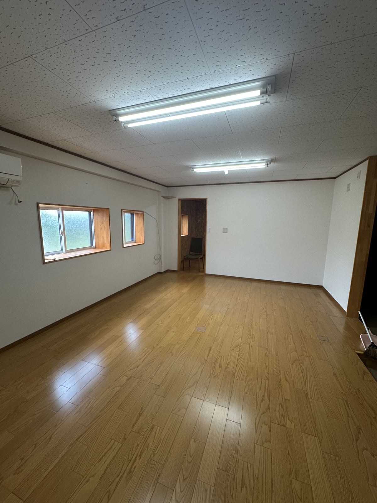 2nd-floor office room with wooden floor